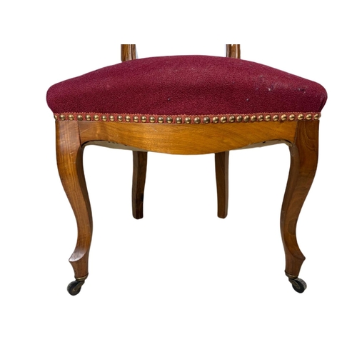 825 - Set of 6 19th century French walnut balloon back chairs.