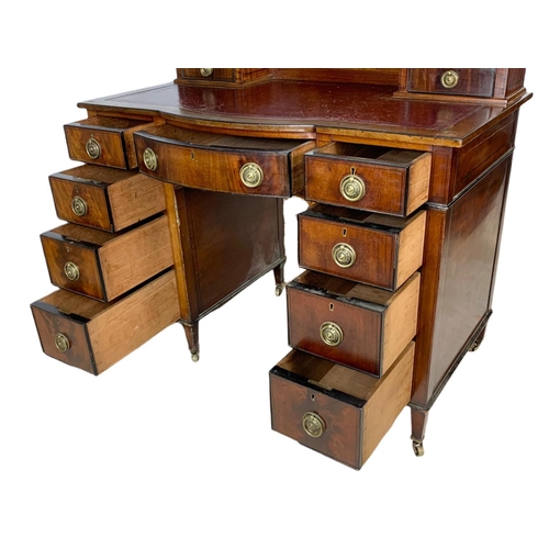 826 - Edwardian leather top desk in the Sheraton style. 102/56/94cm