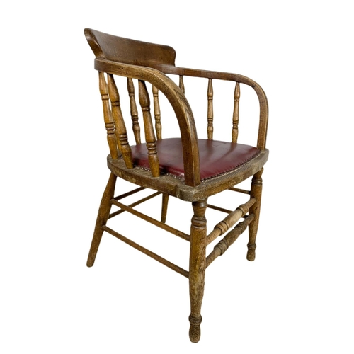 829 - Edwardian oak desk chair.