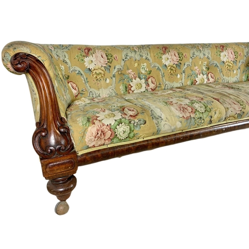 834 - Large Victorian carved mahogany club sofa. 205.5cm