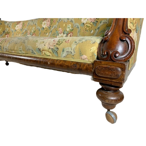 834 - Large Victorian carved mahogany club sofa. 205.5cm