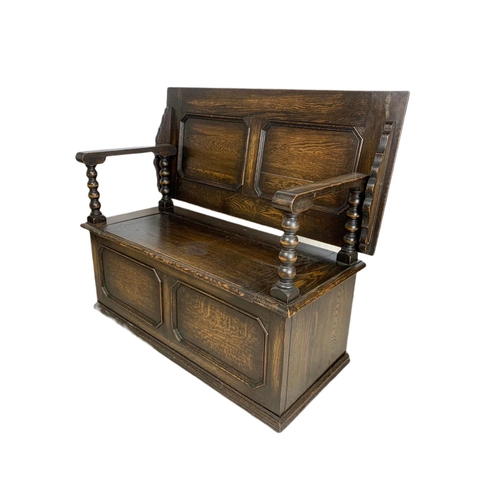 835 - Edwardian carved oak combination hall bench/table. In the Jacobean style. 106/48/68cm