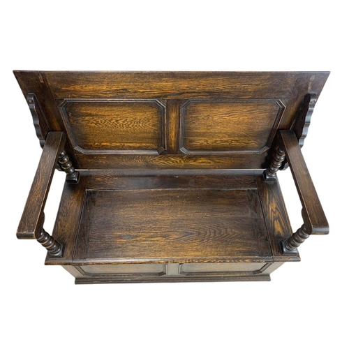 835 - Edwardian carved oak combination hall bench/table. In the Jacobean style. 106/48/68cm