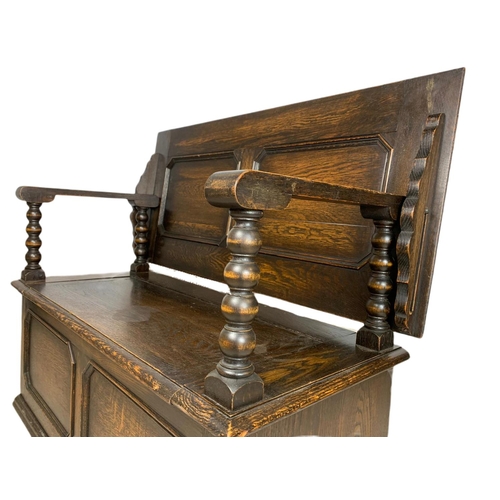 835 - Edwardian carved oak combination hall bench/table. In the Jacobean style. 106/48/68cm