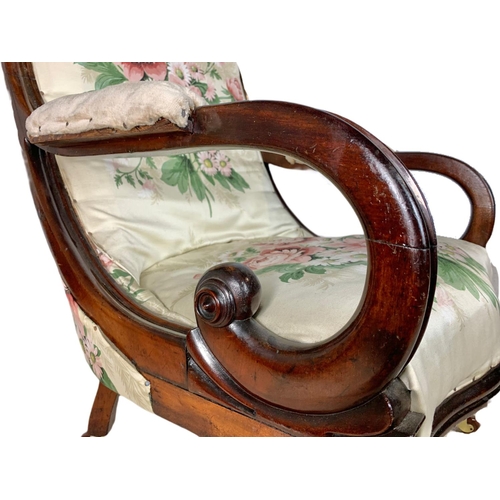 845 - Victorian heavy mahogany carved armchair.