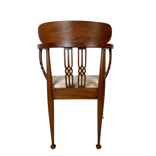 846 - Edwardian inlaid mahogany framed armchair.