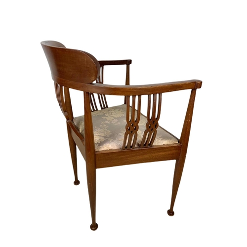 846 - Edwardian inlaid mahogany framed armchair.