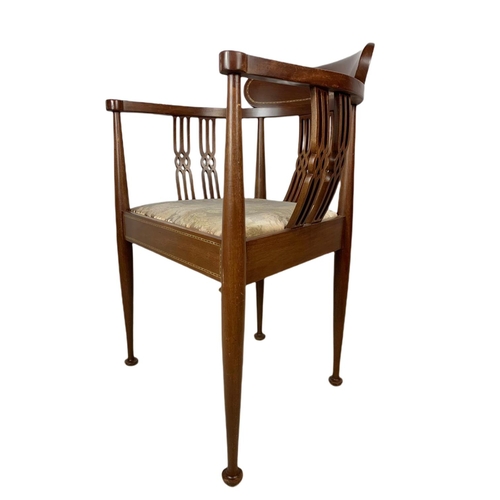 846 - Edwardian inlaid mahogany framed armchair.