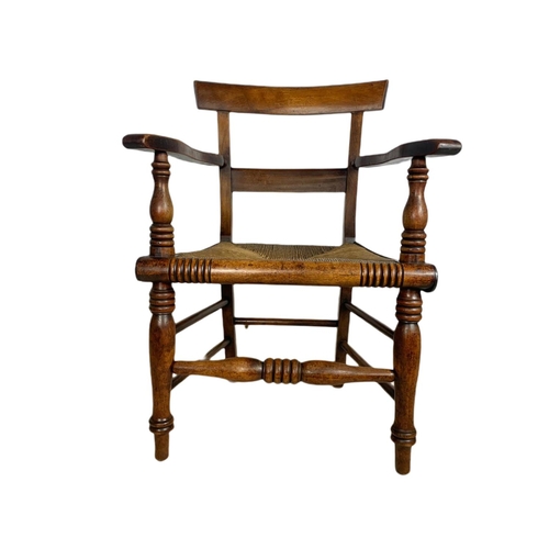 851 - Mid 19th century Scottish country house armchair with rattan seat.