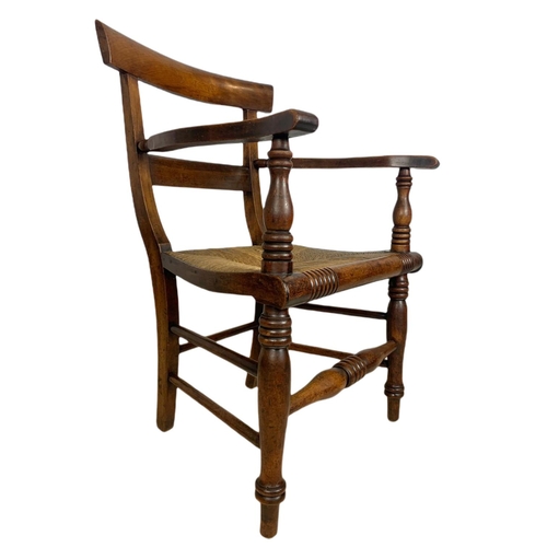 851 - Mid 19th century Scottish country house armchair with rattan seat.