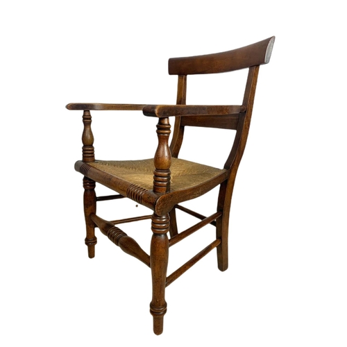 851 - Mid 19th century Scottish country house armchair with rattan seat.