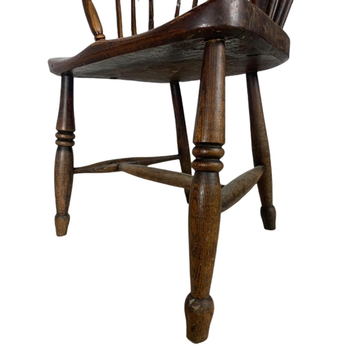 852 - Mid 19th century Windsor armchair. 93cm