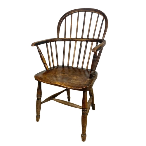 852 - Mid 19th century Windsor armchair. 93cm