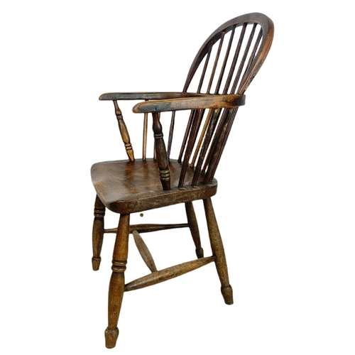 852 - Mid 19th century Windsor armchair. 93cm