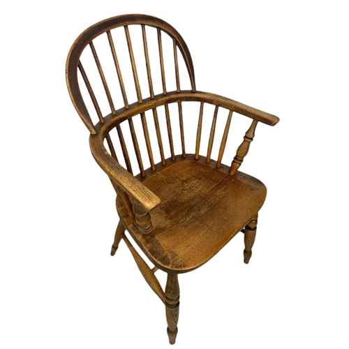 855 - Mid 19th century Windsor armchair. 93cm