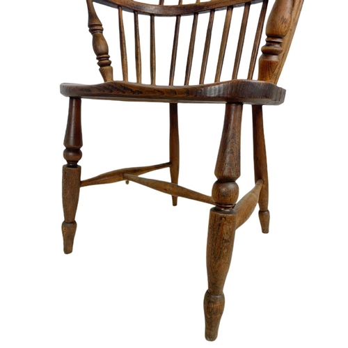 855 - Mid 19th century Windsor armchair. 93cm