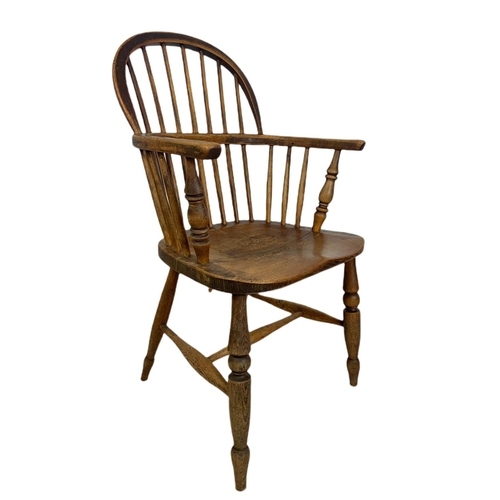 855 - Mid 19th century Windsor armchair. 93cm