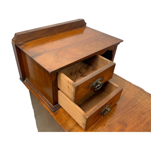 859 - Pair of Edwardian walnut gallery back bedside drawers. 37/60/89cm.