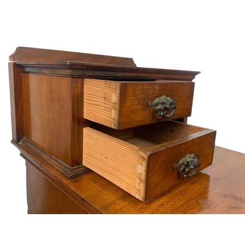 859 - Pair of Edwardian walnut gallery back bedside drawers. 37/60/89cm.