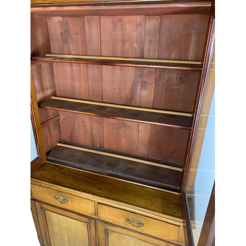 862 - Victorian blonde mahogany 2 door bookcase. 106/44/193cm