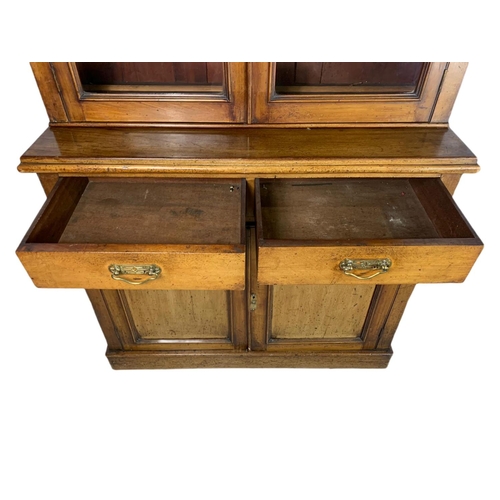 862 - Victorian blonde mahogany 2 door bookcase. 106/44/193cm