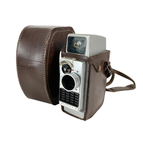 88 - 2 vintage cameras by Bell & Howell and Praktica.