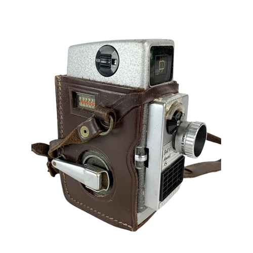 88 - 2 vintage cameras by Bell & Howell and Praktica.