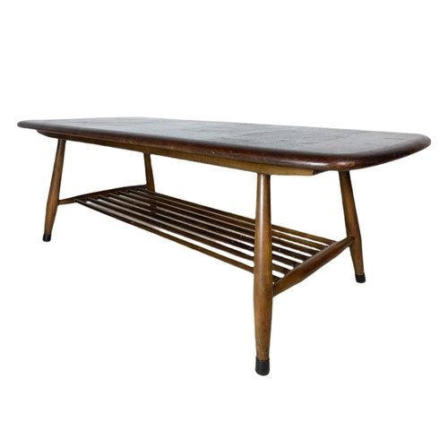 886 - Ercol mid century 2 tier coffee table. 106/46/36cm