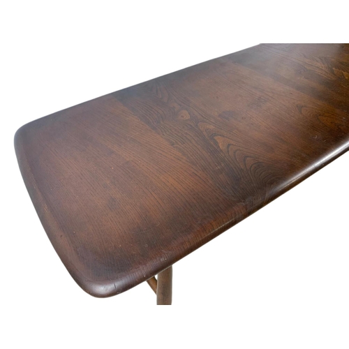 886 - Ercol mid century 2 tier coffee table. 106/46/36cm