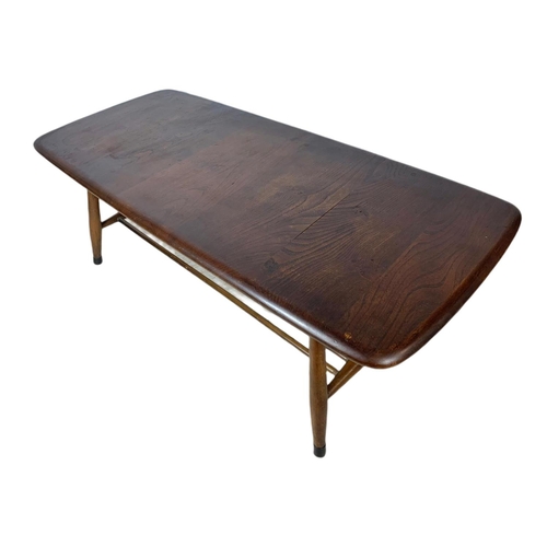 886 - Ercol mid century 2 tier coffee table. 106/46/36cm