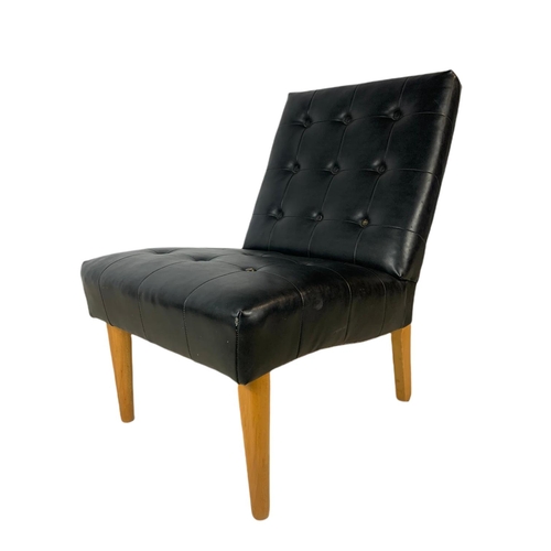 889 - Mid century black vinyl and beech side chair. 50/80/80cm