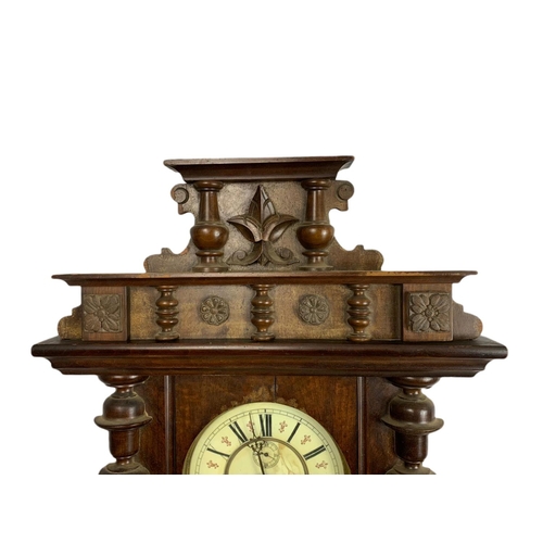 902 - Large Victorian Vienna wall clock with keys and pendulum. 113cm