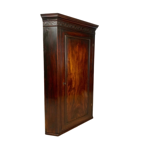 909 - Tall Georgian inlaid mahogany hanging corner cupboard with 3 fitted shelves. 80/49/120cm