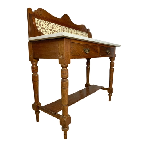 921 - Edwardian marble top 2 drawer washstand. 115/48/110cm