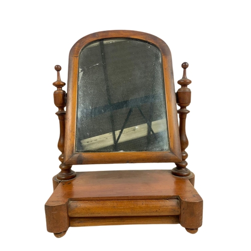 294 - Victorian mahogany shaving mirror. 42/51cm