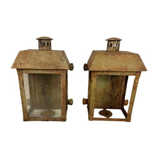 325 - Pair of vintage scratch made metal candleholders. 27/19/49cm