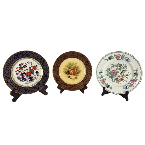 562 - 3 Aynsley pottery plates. 27cm.