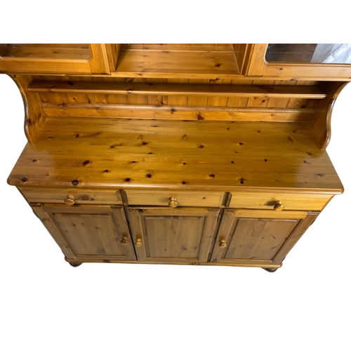 805 - Pine kitchen dresser. 132/45/190cm