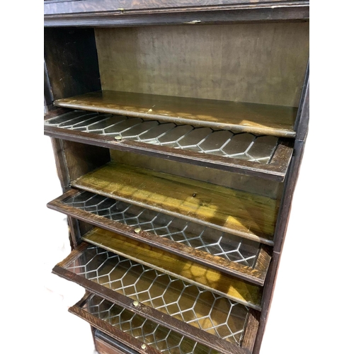 877 - Large Edwardian stacking bookcase with drawer by Gumm. 86.5/36/188cm