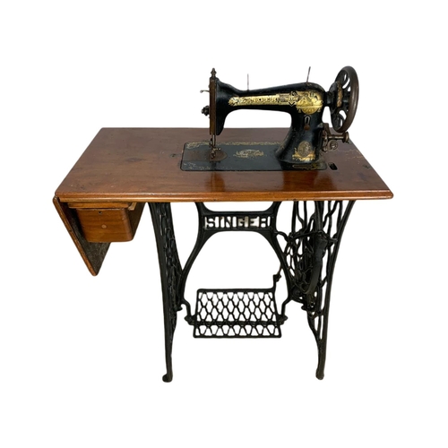 897 - Early 20th century singer sewing machine table. 79/42/101cm