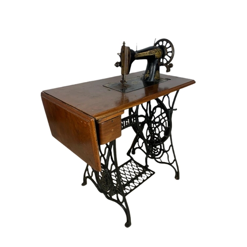 897 - Early 20th century singer sewing machine table. 79/42/101cm