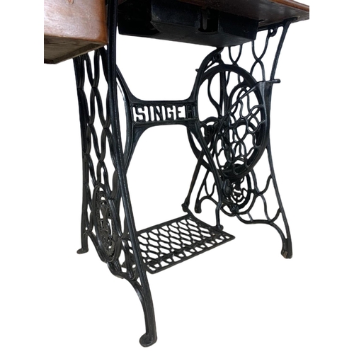 897 - Early 20th century singer sewing machine table. 79/42/101cm