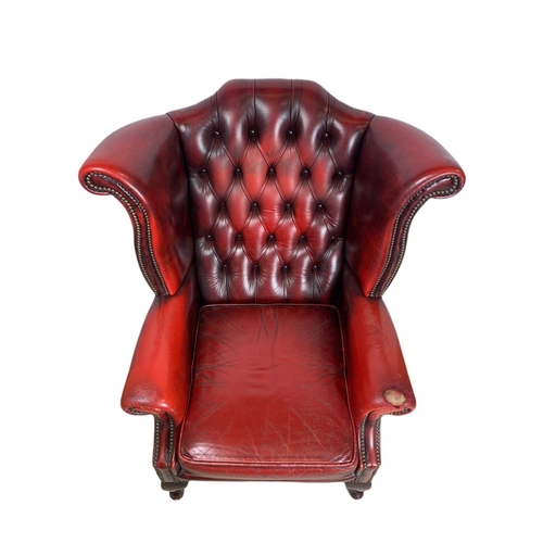 898 - Vintage deep button leather wingback armchair