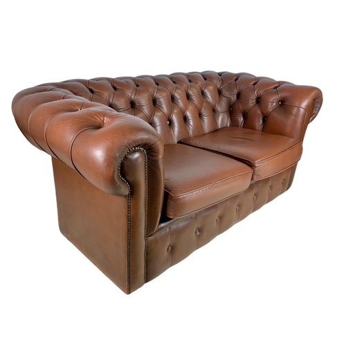 905 - 2 seater leather Chesterfield club sofa. 156cm.