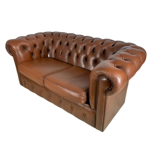 905 - 2 seater leather Chesterfield club sofa. 156cm.