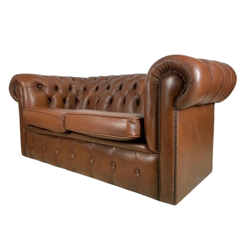 905 - 2 seater leather Chesterfield club sofa. 156cm.