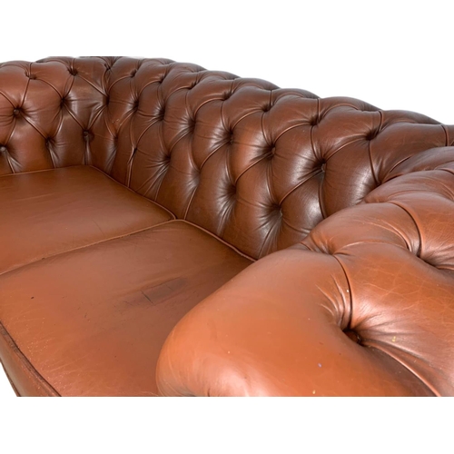 905 - 2 seater leather Chesterfield club sofa. 156cm.