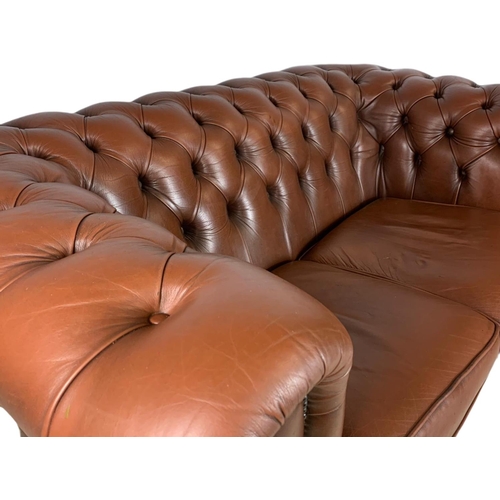 906 - 2 seater leather Chesterfield club sofa. 156cm