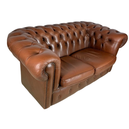 906 - 2 seater leather Chesterfield club sofa. 156cm