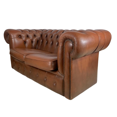 906 - 2 seater leather Chesterfield club sofa. 156cm